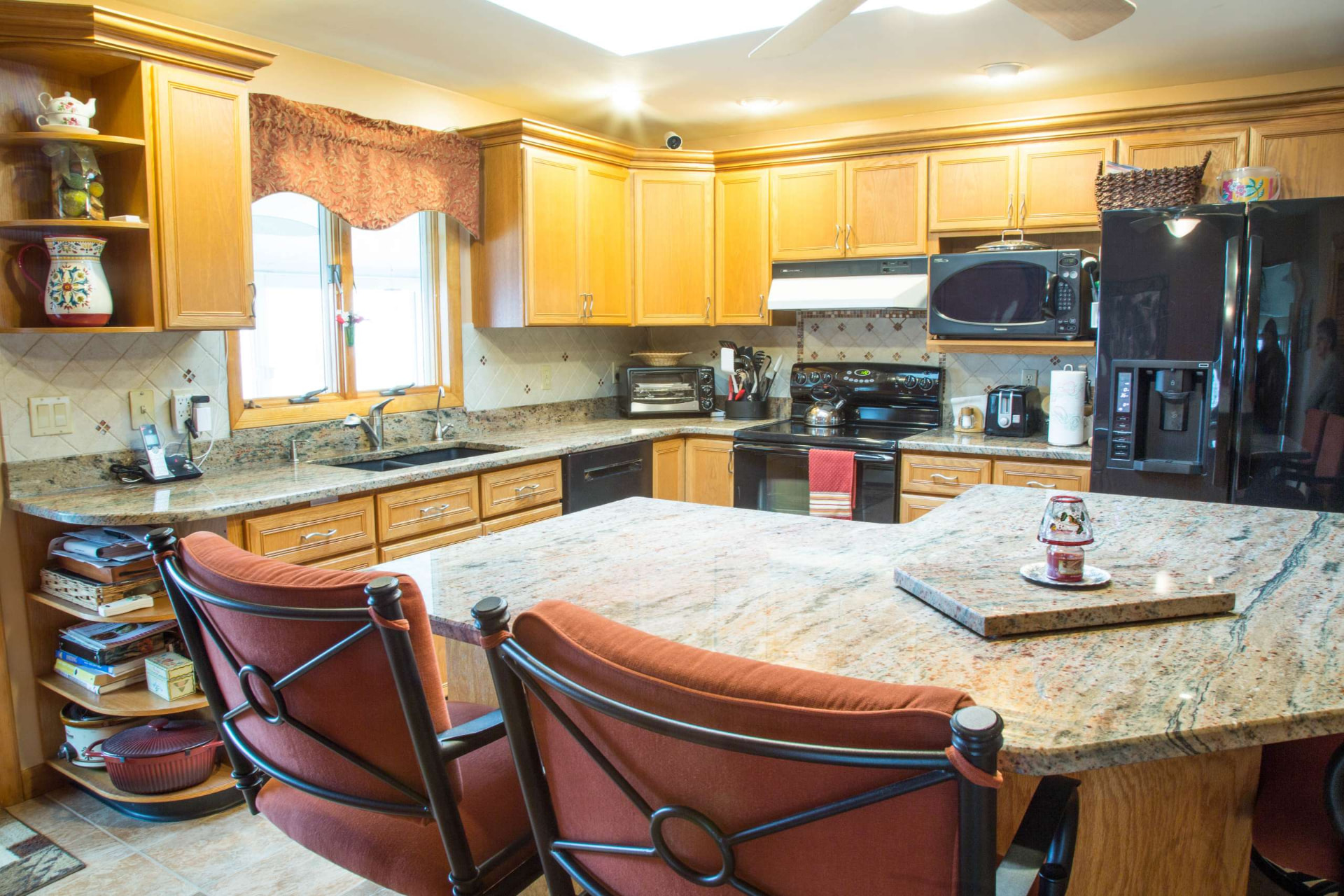 Dated oak kitchen — before cabinet refinishing
