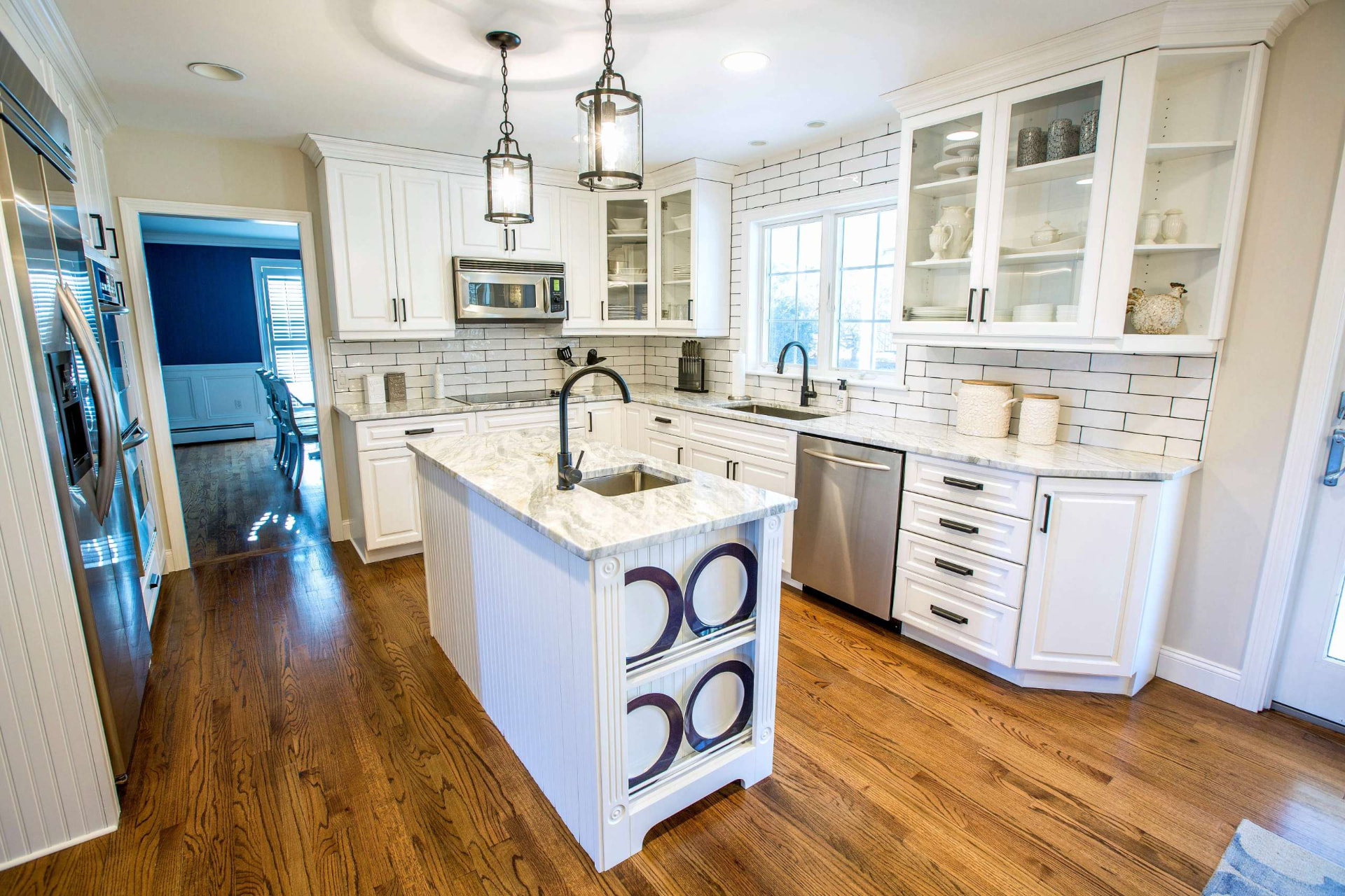 Completed white kitchen with marble island
